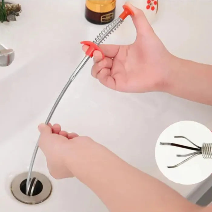 85cm kitchen pipe dredging tool in use to unclog a sink drain.