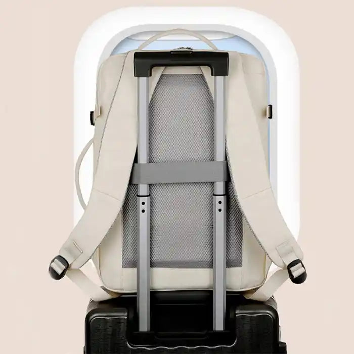 Versatile cream business backpack with breathable back panel and suitcase strap for travel readiness.