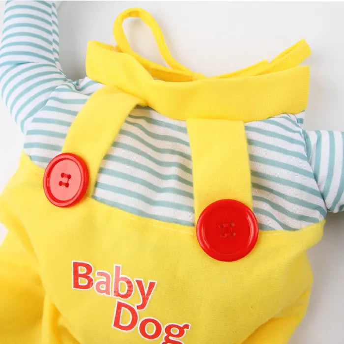 Close-up of Cat Halloween costume showing red buttons on yellow overalls and striped top detail.