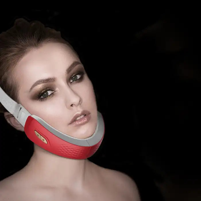 Facial slimming device worn by model showing jawline contouring and skin tightening function