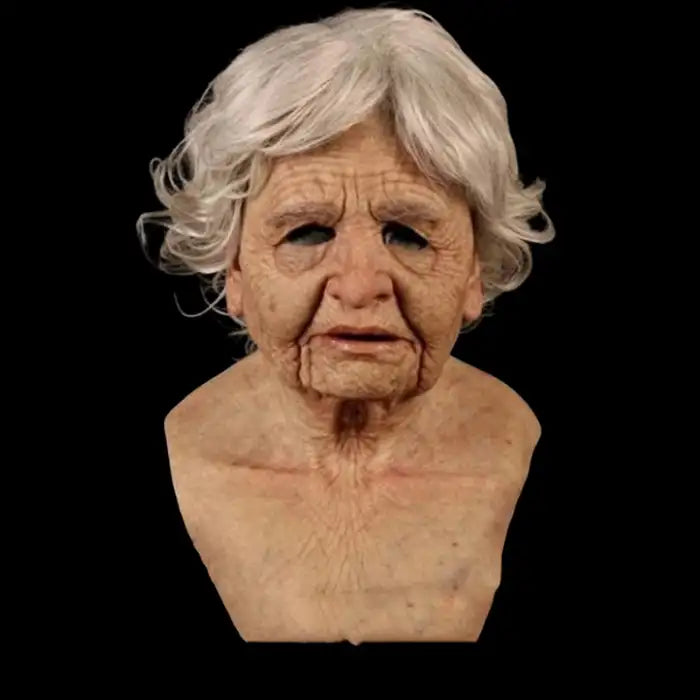 Halloween Mask of elderly woman with curly white hair, deep wrinkles, and sunken expression