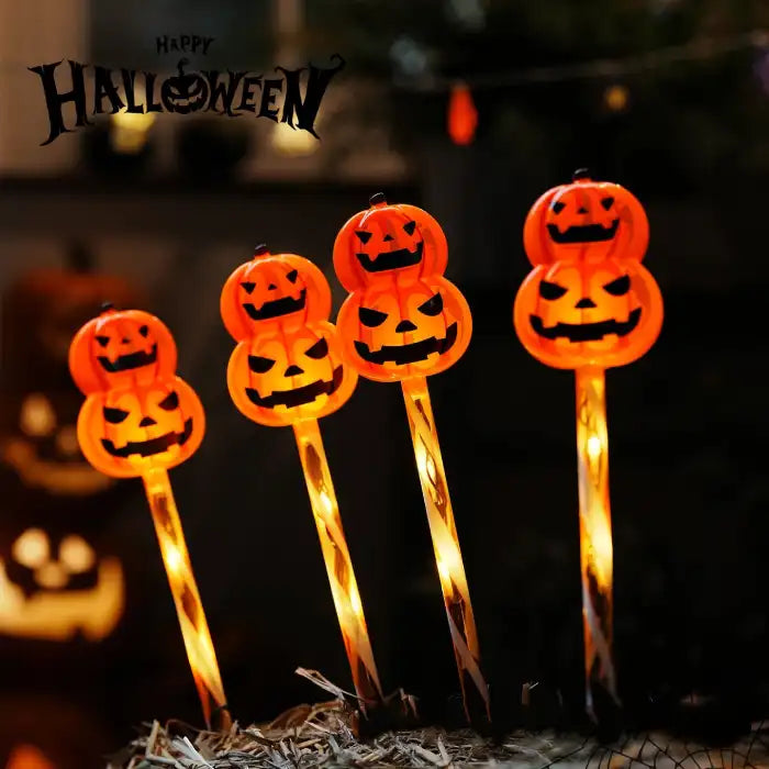 Halloween Pumpkin LED lights with glowing double jack-o'-lantern heads in spooky festive garden display