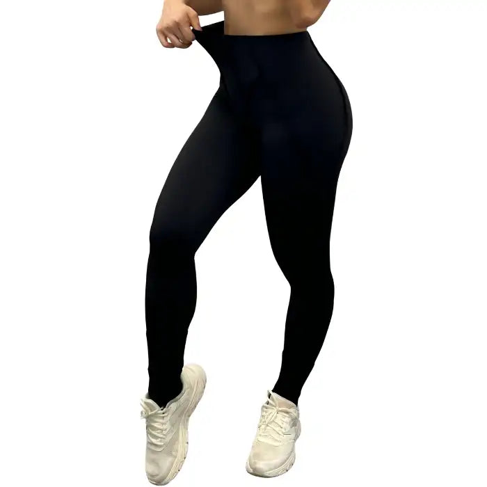 High-waisted leggings in black with slimming front view, built for fitness and everyday style.