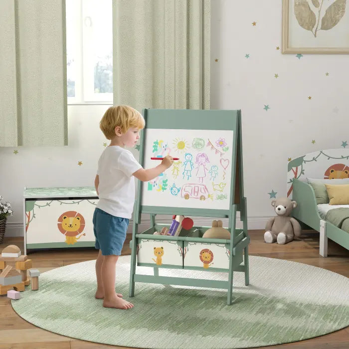 Boy drawing on kids whiteboard learning organizer with toy storage in a cozy bedroom.