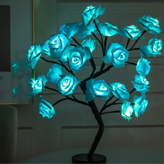 LED tree lamp featuring luminous blue rose flowers, creating a vibrant and relaxing atmosphere.