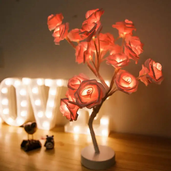 LED tree lamp with soft red glowing rose petals, ideal for cozy romantic table or bedroom decor.