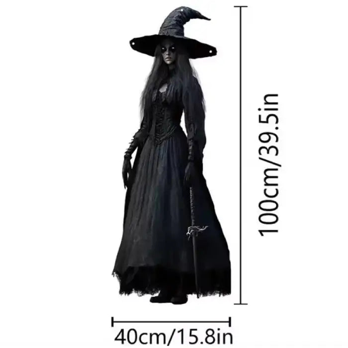 Black witch life size Halloween prop with hat and staff, measured at 100cm tall and 40cm wide.