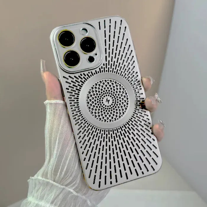 Magnetic wireless phone case in gray with radial vented design held by hand in neutral lighting.
