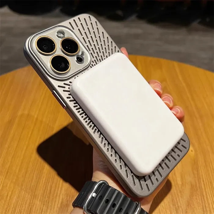 Magnetic wireless phone case in silver with white magnetic power bank attached to the center rear.
