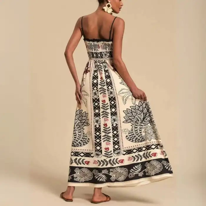 Maxi dress back view featuring smocked bodice, spaghetti straps, and vintage bohemian print.