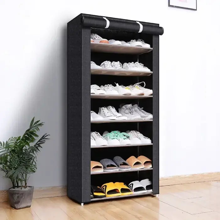 Multi-tier shoe storage cabinet with modern design, shown with bedroom furniture for organized footwear display