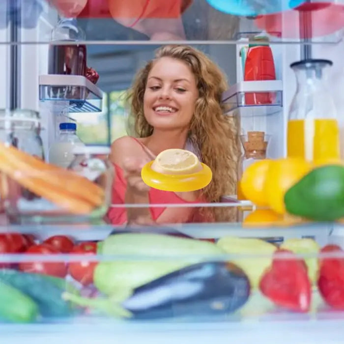 organized fridge with a lemon storage box, surrounded by fresh fruits and vegetables