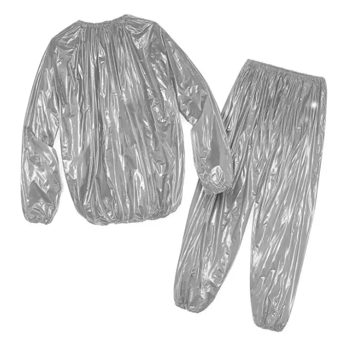 Two-piece silver sauna suit laid flat, featuring elastic hems and lightweight material for heat insulation.