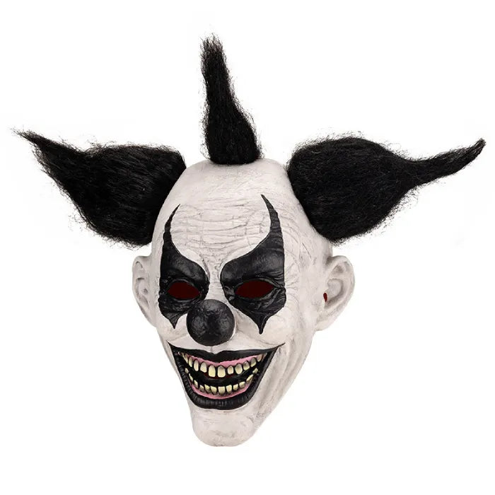 Angled view of scary full head latex clown mask with sharp teeth and wild black hair.