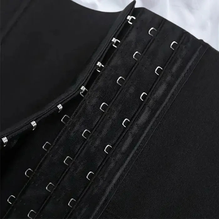 Close-up of shapewear hook and eye design with triple rows for adjustable waist compression fit.