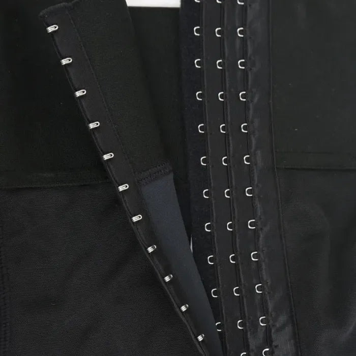 Inner view of shapewear triple hook closure system showing reinforced stitching and compression design.