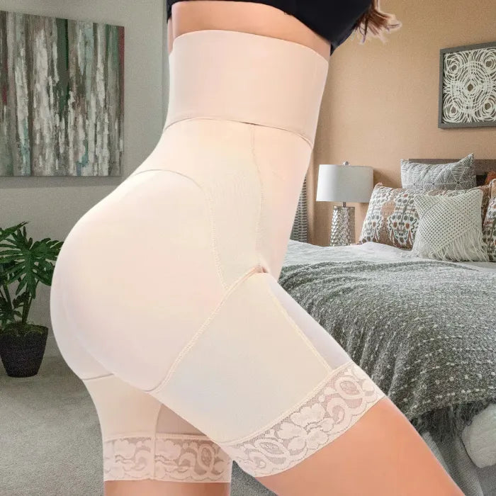 Side profile of nude shapewear with defined butt lift contour and supportive waist panel.