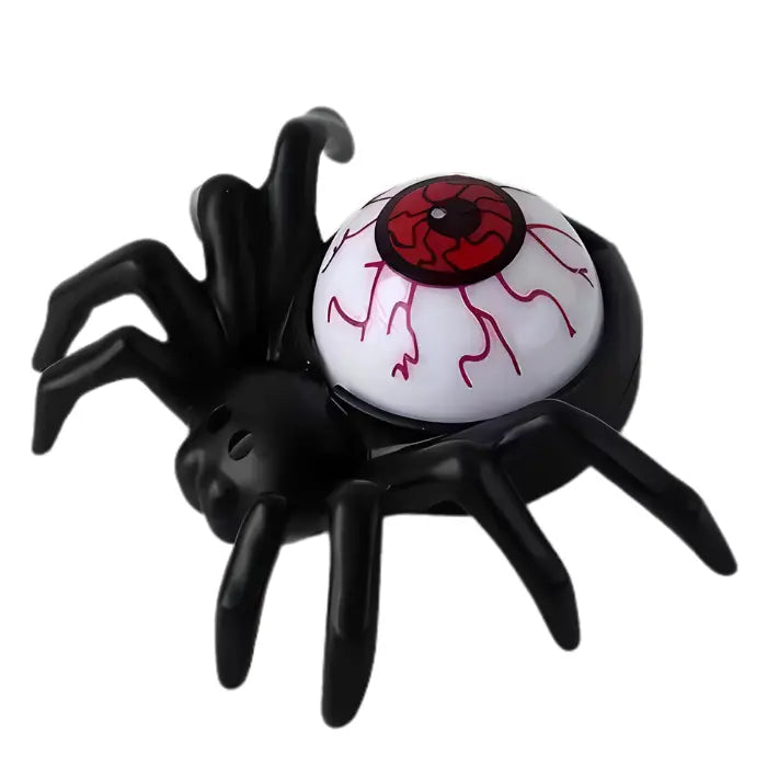Red LED spider candle with bloodshot eyeball body for creepy Halloween ambiance.