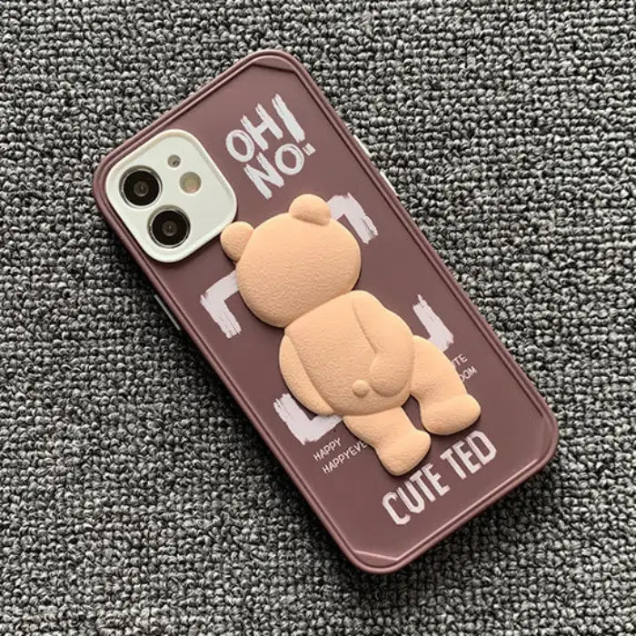 Ted iPhone case protector in brown with a 3D teddy bear design showing the back view and "OH! NO!" text.