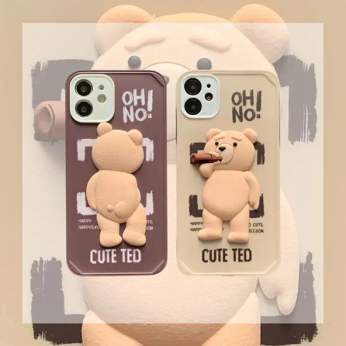 Beige Ted iPhone case protector with a 3D teddy bear holding a cigar, displayed flat on a textured surface.