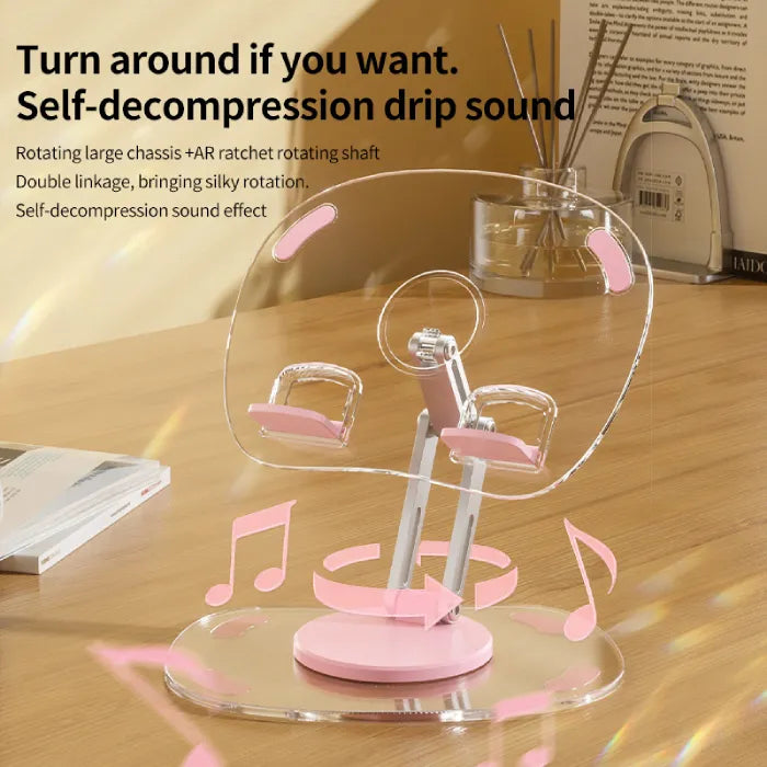 Transparent tablet stand with drip sound feature and rotating base for stable desktop device positioning.