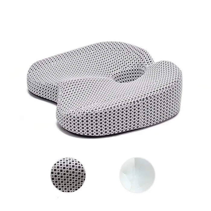 White ergonomic seat cushion with breathable mesh pattern showing detailed texture and supportive design features
