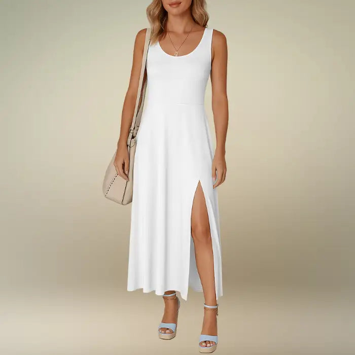 Full front studio view of the white sleeveless A-line midi dress with scoop neck and side slit. Buy this essential summer dress online, a perfect blend of comfort and style.