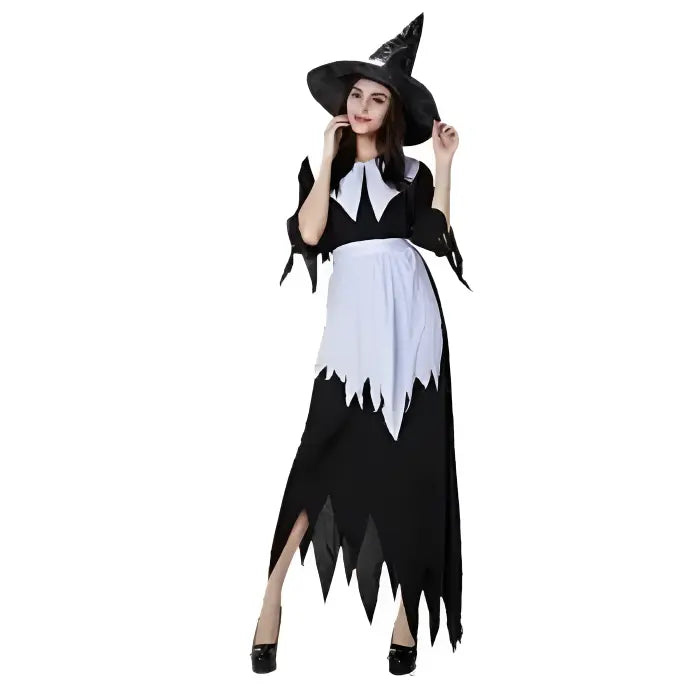 Wicked witch Halloween costume with black dress, jagged hem, and white apron.