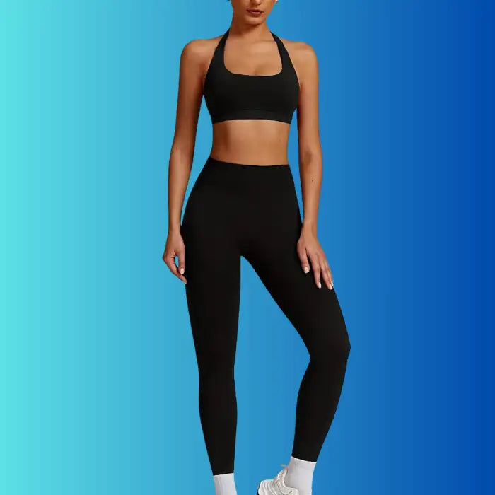 Yoga Workout Set in black with halter sports bra and ankle-length leggings viewed from the front.