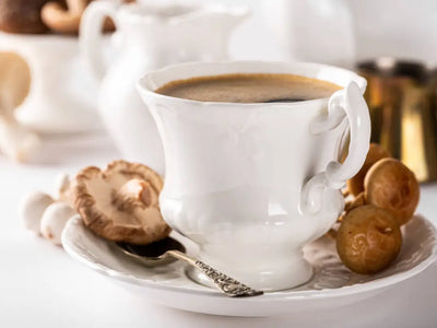 Vintage coffee cup with mushrooms on the plate