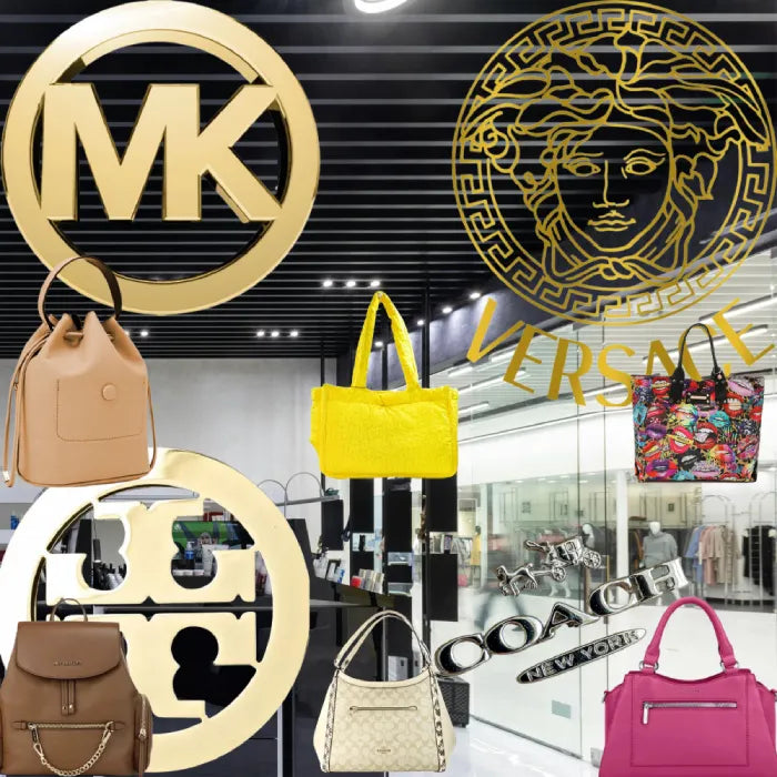 Designer handbags displayed in a luxury store setting, featuring brands like Coach, Michael Kors, and Versace.