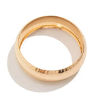 Gold ring on a white background