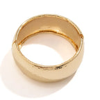 Gold ring on a white background