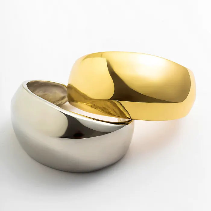Gold and silver ring on a white background