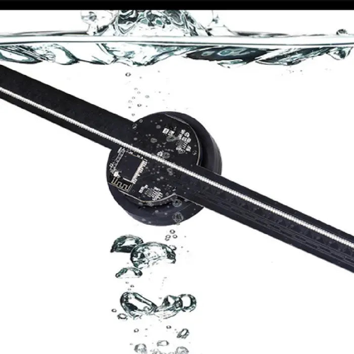  3D Hologram Projector shown mid-submersion with water bubbles highlighting durable design features.