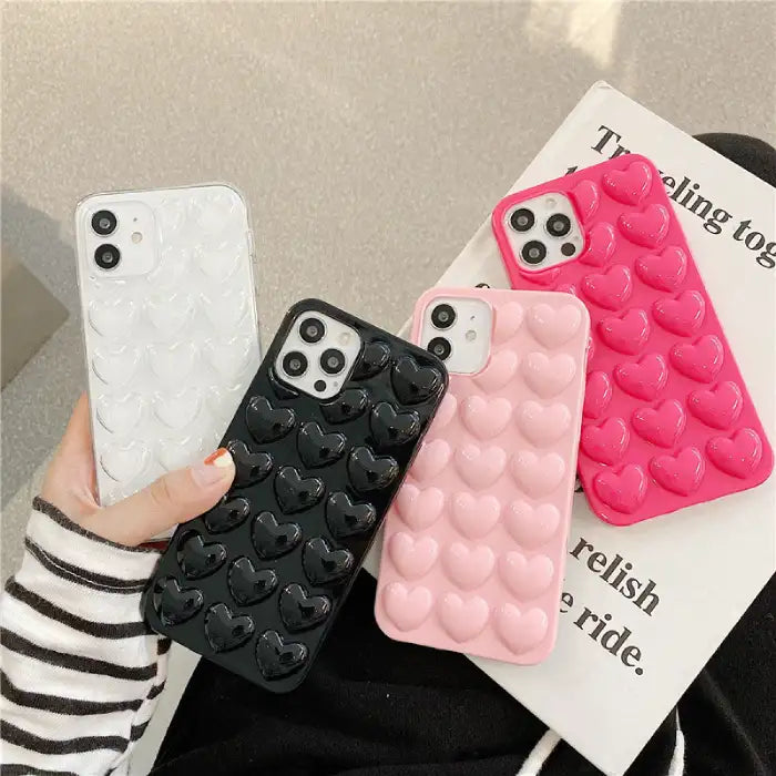 3d iphone heart protective cases in different colors, pink, transparent, rose red and black