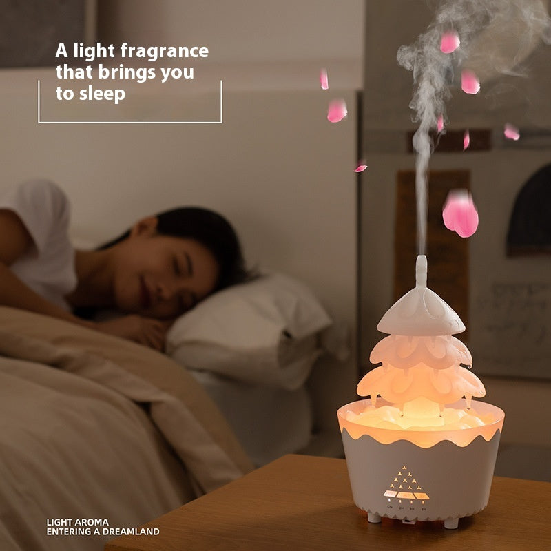 Christmas tree diffuser humidifier for relaxing home ambiance.