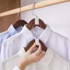 6 Hanger Connection Hooks shown as a hand attaches a hanger to create vertical shirt storage.