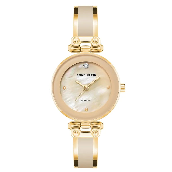 Anne Klein gold watch with diamond accent.