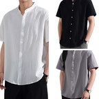 Three shirts in white, black, and gray on a white background