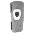 Automatic air freshener device with grey fabric cover and white dispenser face mounted on wall