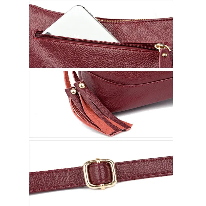 Detailed shot of red leather handbag's zipper and tassel for fashion enthusiasts.