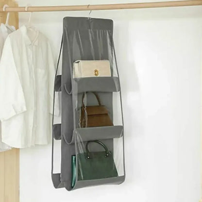 Grey hanging organizer with handbags on a rod.