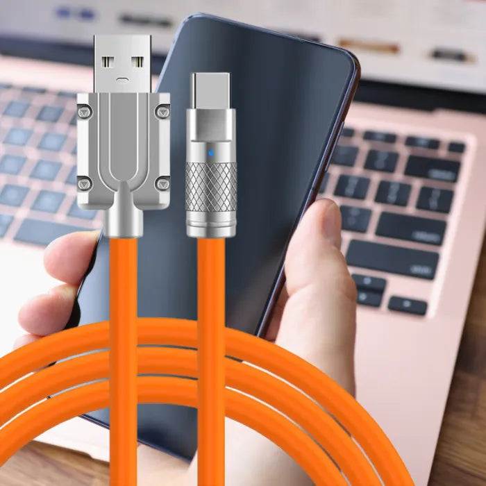 Orange 120W fast charging cable connecting USB to Type C, suitable for various devices.