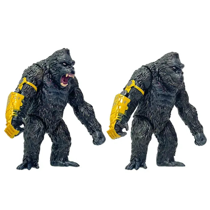 Both king kong action figures with calm and angry face with yellow robot arm left angle view