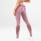 Mesh detail performance leggings in rose red with seamless sculpting fit and breathable mesh accents.