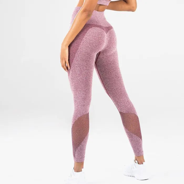 Mesh detail performance leggings in rose red with seamless sculpting fit and breathable mesh accents.