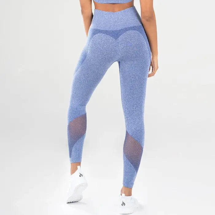Mesh detail performance leggings in blue with high waist, contour fit, and breathable inserts.