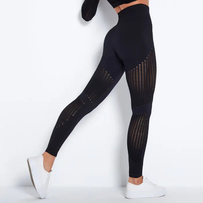 Mesh panel high-waist legging in classic black with breathable mesh and high-performance comfort.