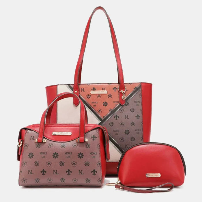 Red patterned Nicole Lee tote bag, satchel, and cosmetic pouch set with floral and monogram print